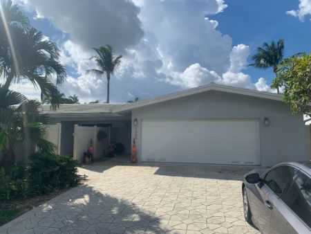 Painted Tile Roof and Gutter Cleaning in Pompano Beach, Florida