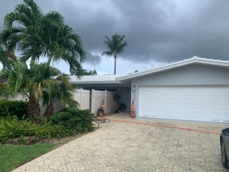 Painted Tile Roof and Gutter Cleaning in Pompano Beach, Florida Image