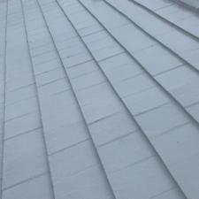 Painted Tile Roof and Gutter Cleaning in Pompano Beach, Florida 16
