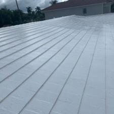 Painted Tile Roof and Gutter Cleaning in Pompano Beach, Florida 17
